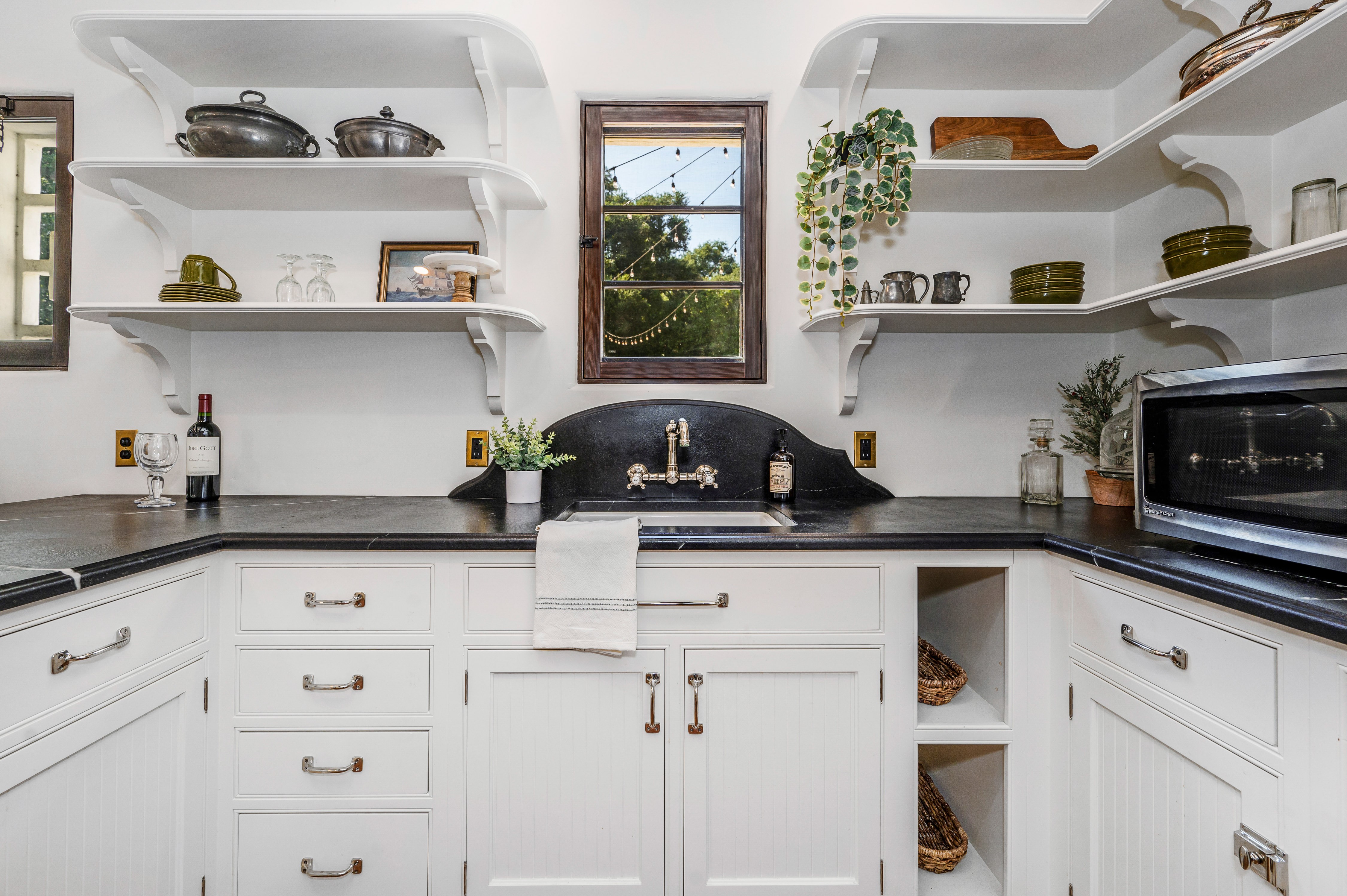 Bright kitchen with white Shaker cabinetry